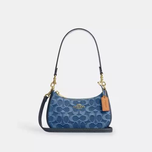 حقيبة كوتش ميني تيري جنز سيغنتشر دنيم تصل خلال ٢-٤...