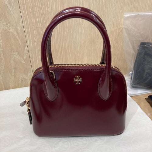 حقيبة توري بورش ايمرسون دوم لماع عنابي فوري | Tory...