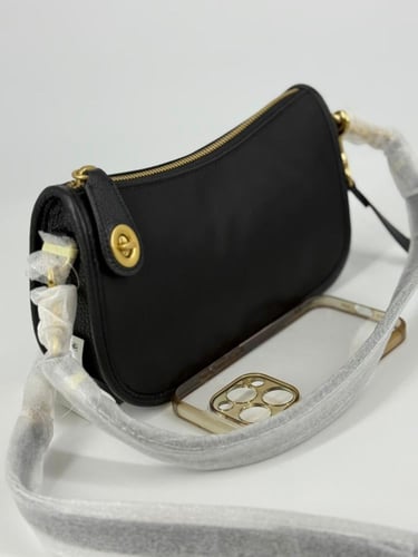 حقيبة كوتش سوينجر فوري