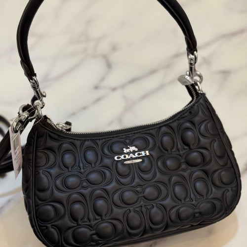 حقيبة كوتش تيري شولدر محفر فوري