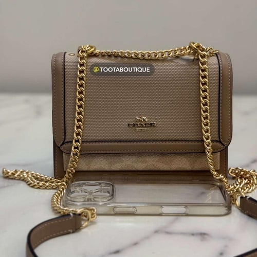 حقيبة كوتش ميني كلير قماش/جلد فوري