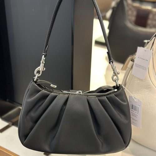 حقيبة كوتش تيري شولدر بكسرات فوري