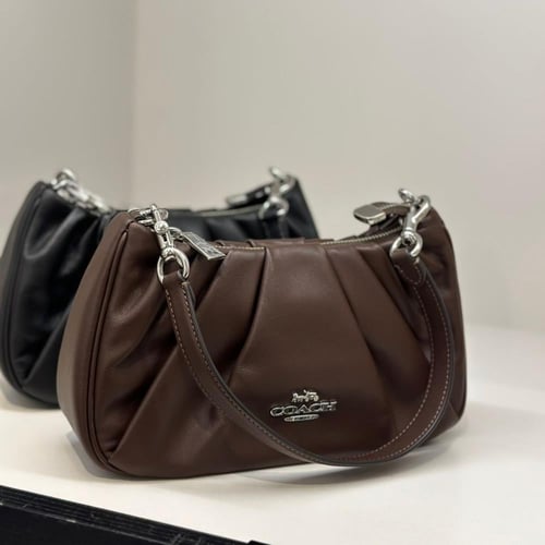 حقيبة كوتش تيري شولدر بكسرات فوري