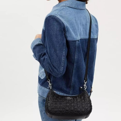 حقيبة كوتش تيري شولدر محفر فوري