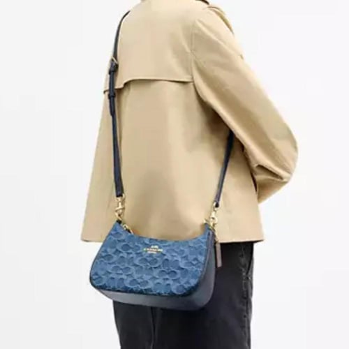 شنطة كوتش كتف تيري سيغنتشر دنيم تصل خلال ٢-٤ أسابي...