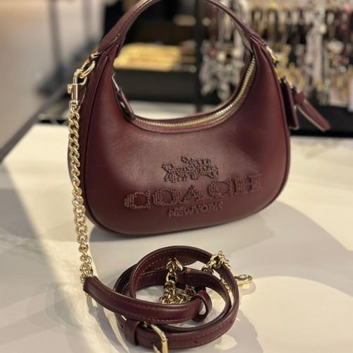 حقيبة كوتش ميني كارمن عنابي فوري