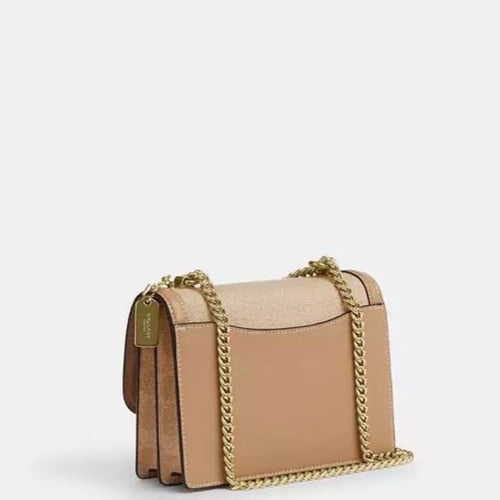 حقيبة كوتش ميني كلير قماش/جلد فوري