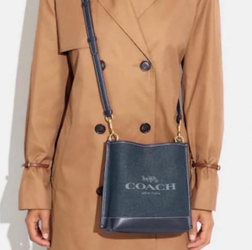 شنطة كوتش مولي بوكت قماش سمول فوري