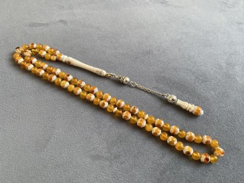 سبحة عاج فيل مطعّمة كهرمان و فضة