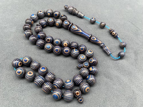 سبحة خشب السكيت بورد ازرق