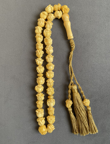 سبحة كهرمان نقشة الزهرة