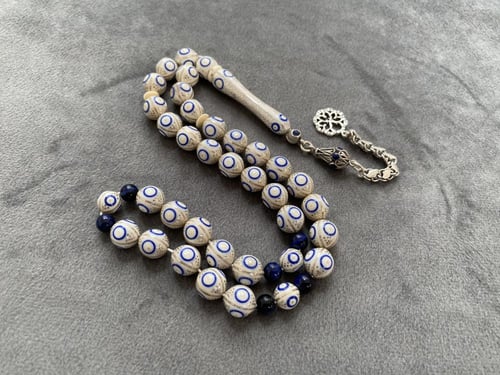 عاج فيل مطعّم فضة و لازورد