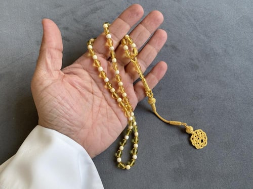 سبحة كهرمان و عاج فيل