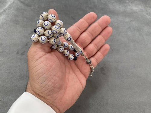 عاج فيل مطعّم فضة و لازورد