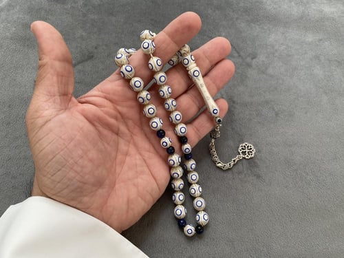 عاج فيل مطعّم فضة و لازورد