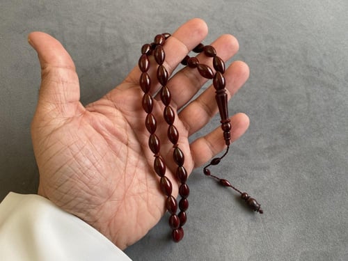 سبحة خشب الكوك لون عنابي