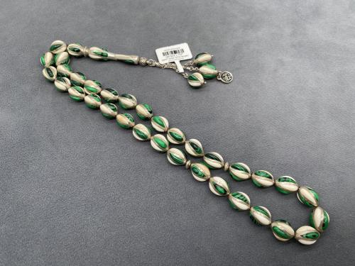 قفص فضة عاج و ملاكايت