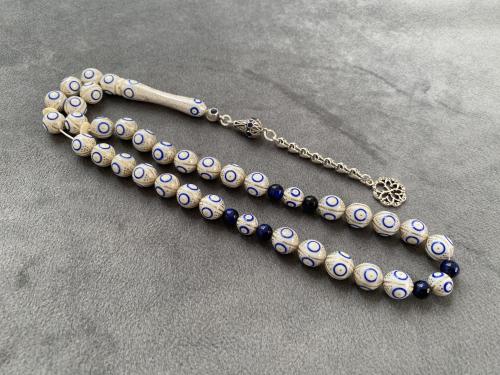 عاج فيل مطعّم فضة و لازورد