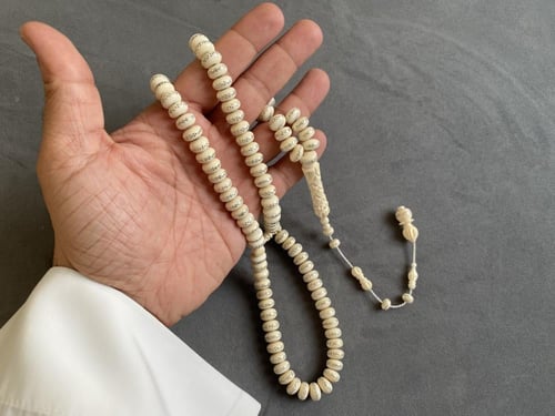 سبحة عاج فيل مطعّم بالفضة