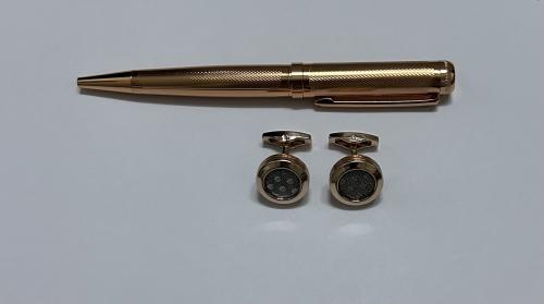 An elegant pen and cufflink set