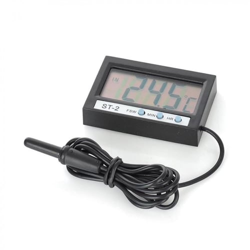 ساعة ومقياس حرارة