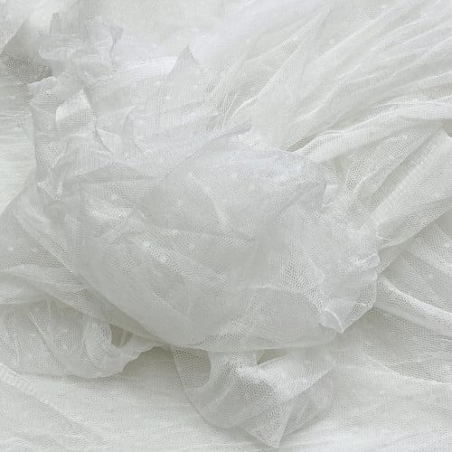 تل أبيض منقط / صناعة الهند