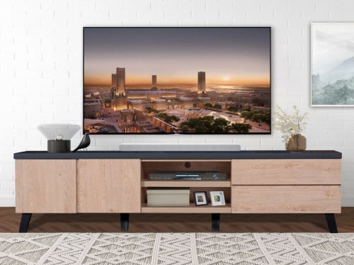 وحدة تلفاز مودرن خشبي وسطح اسود