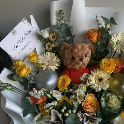 باقة ورد مع دبدوب