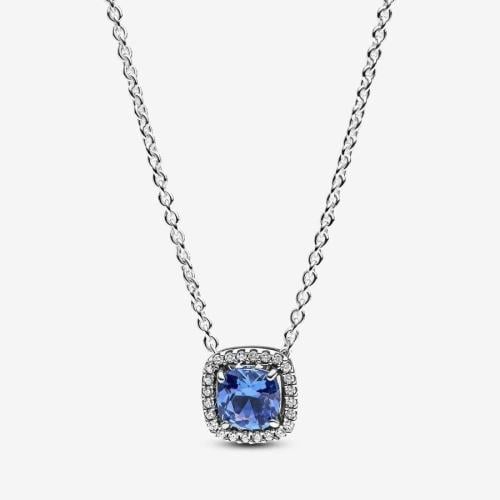 Women's necklace of sterling silver with blue crys...