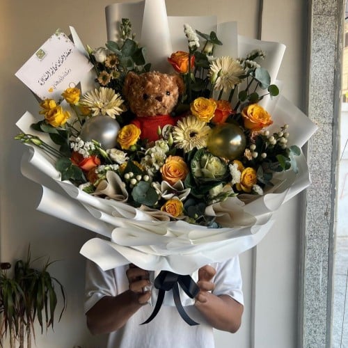 باقة ورد مع دبدوب