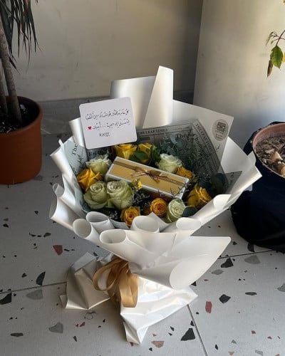 باقة ورد بالاضافه الى شوكلاتة بستاني