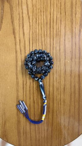 Blue mixed prayer beads with a tassel