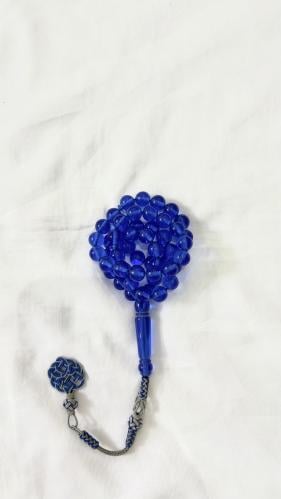 Blue transparent agate prayer bead with copper acc...