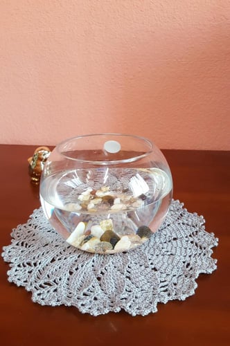 مفرش رمادي دائري