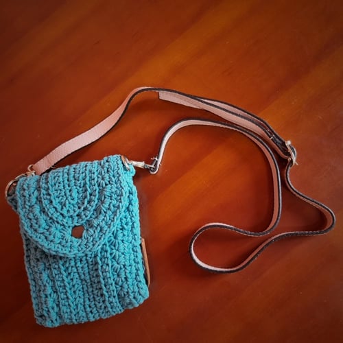 حقيبة يد فيروزي