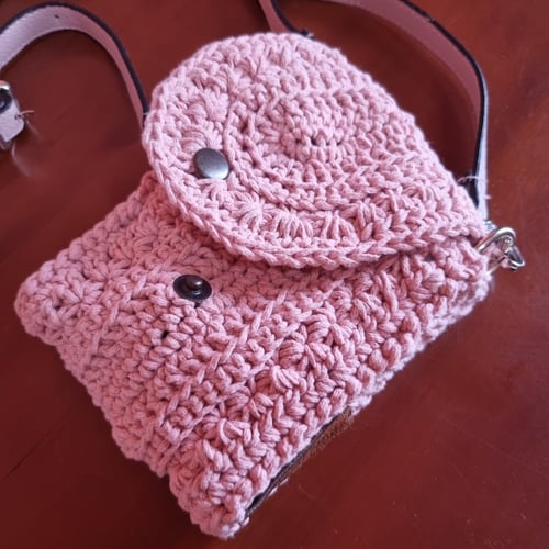 حقيبة يد صغيرة وردية