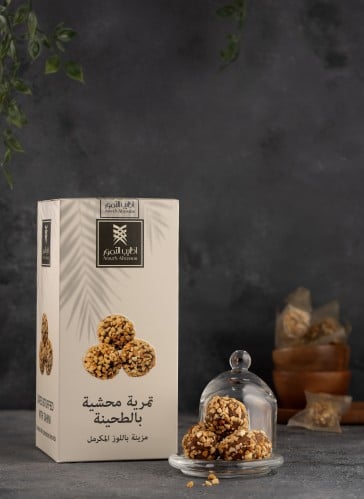 تمرية محشيه بالطحينة مزيّنه باللوز المكرمل