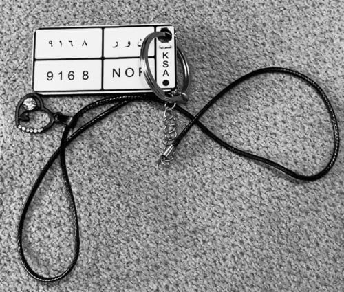 تعليقة لوحة سياره