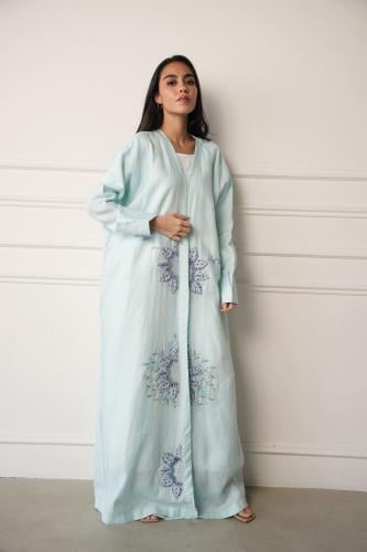 A sky blue abaya with luxurious embroidery done by hand