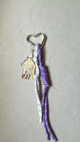 A heart-shaped pendant with a personal photo and a...