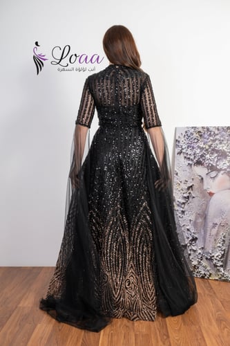 فستان سهرة اسود بتطريز ذهبي