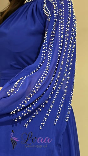 فستان السهرة الأزرق الملكي بكاب لؤلؤي فاخر