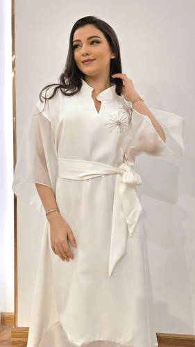 فستان لمسة الؤلؤ بأناقة الأبيض الفاخر