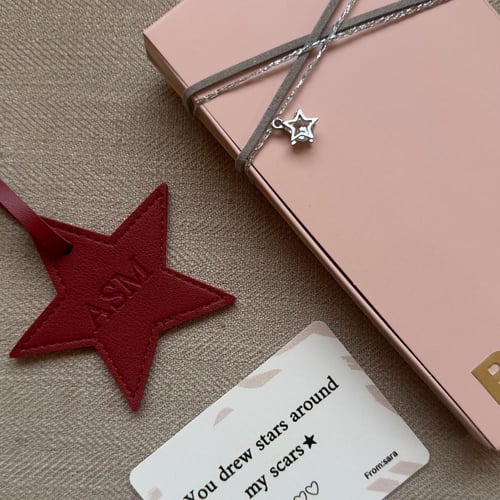 نجمة(أحمر عنابي)