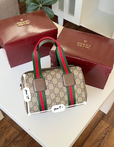 شنطة قوتشي حجمين