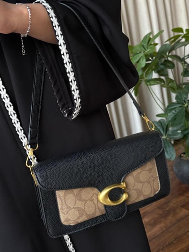 شنطة كوتش جلد ولمعه