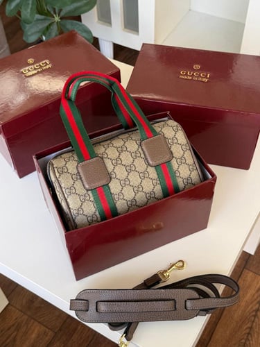 شنطة قوتشي حجمين