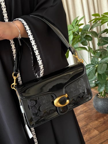 شنطة كوتش جلد ولمعه