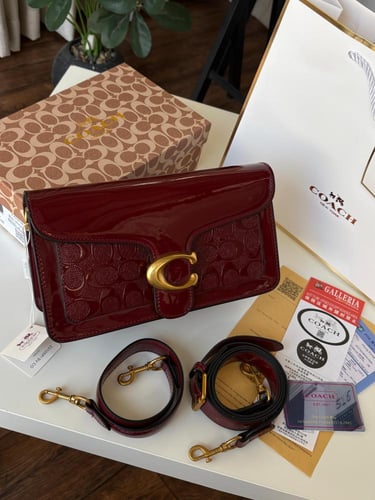 شنطة كوتش جلد ولمعه