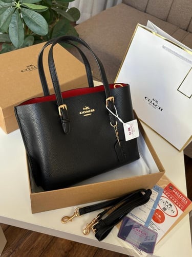 شنطة كوتش مولي بألوانها الرسميه